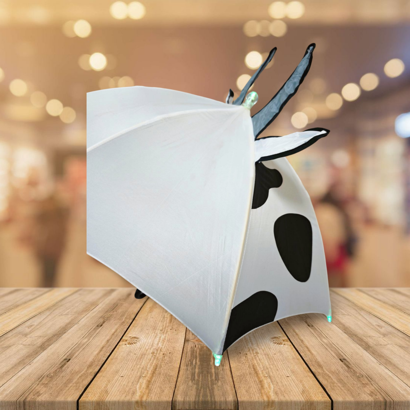 https://www.hodaumbrella.com/playful-moo-the-led-cow-umbrella-product/