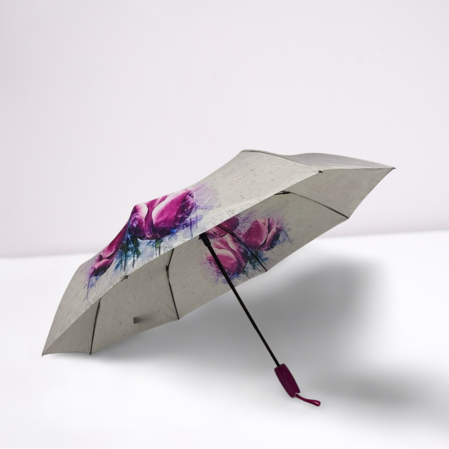 https://www.hodaumbrella.com/three-fold-umbrella-with-tulip-shaped-handle-product/